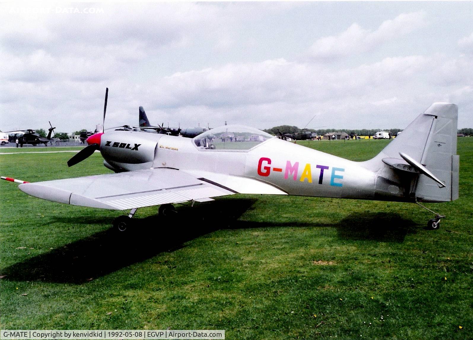 G-MATE, 1990 Zlin Z-50LX C/N 0068, At the World Helicopter Championships, Middle Wallop.