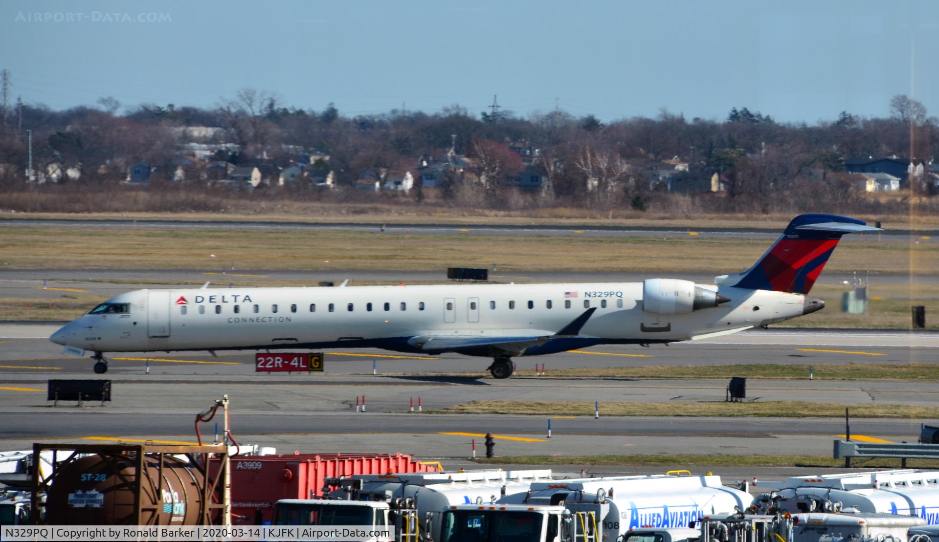 N329PQ, 2014 Bombardier CRJ-900 (CL-600-2D24) C/N 15329, Taxi JFK