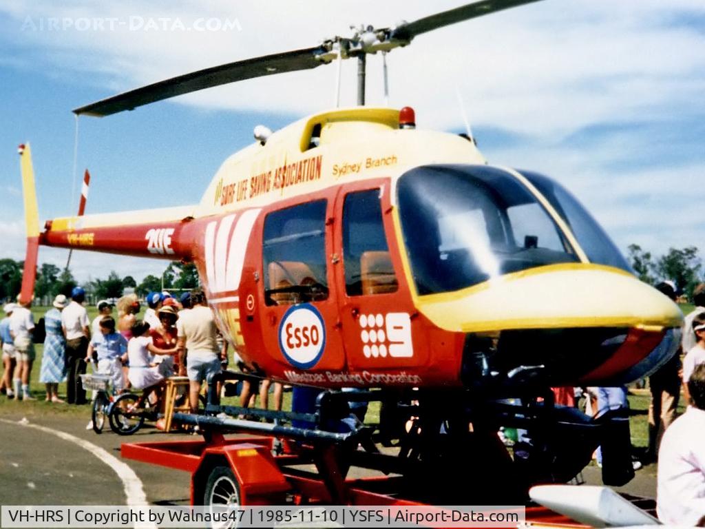 VH-HRS, 1986 Bell 412SP C/N 33118, Close-cropped front Stbd view of trailer- mounted ‘Surf Life Saving Association’ Bell 206A VH-HRS (on modified skid landing gear) on static display at the Schofields Air Show (held at HMAS Nirimba) YSFS NSW on 10Nov1985. MSN/Cn Unknown. (Not a B412SP)