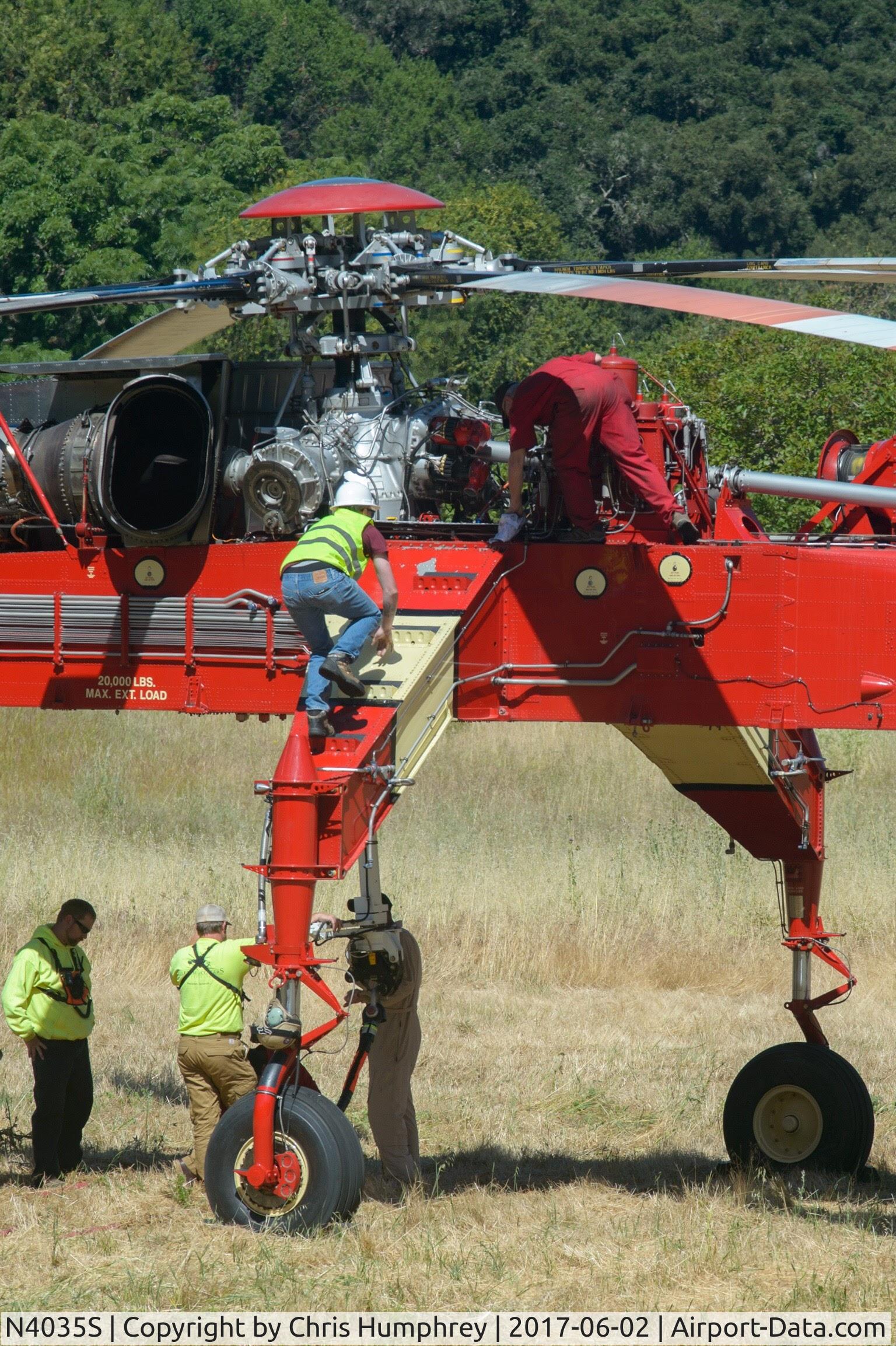 N4035S, 1975 Sikorsky S-64E C/N 64099, Assisting with the movement of equipment to shore up a persistent mud slide in Castro Valley California.