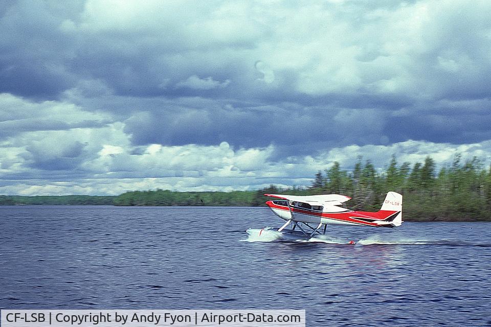 CF-LSB, 1959 Cessna 180B C/N 50580, CF-LSB delivering food to a geologists' mineral exploration camp, McVickar Lake, northwestern Ontario, July 1975. Likely flew out of Pickle Lake water base, but I am uncertain.