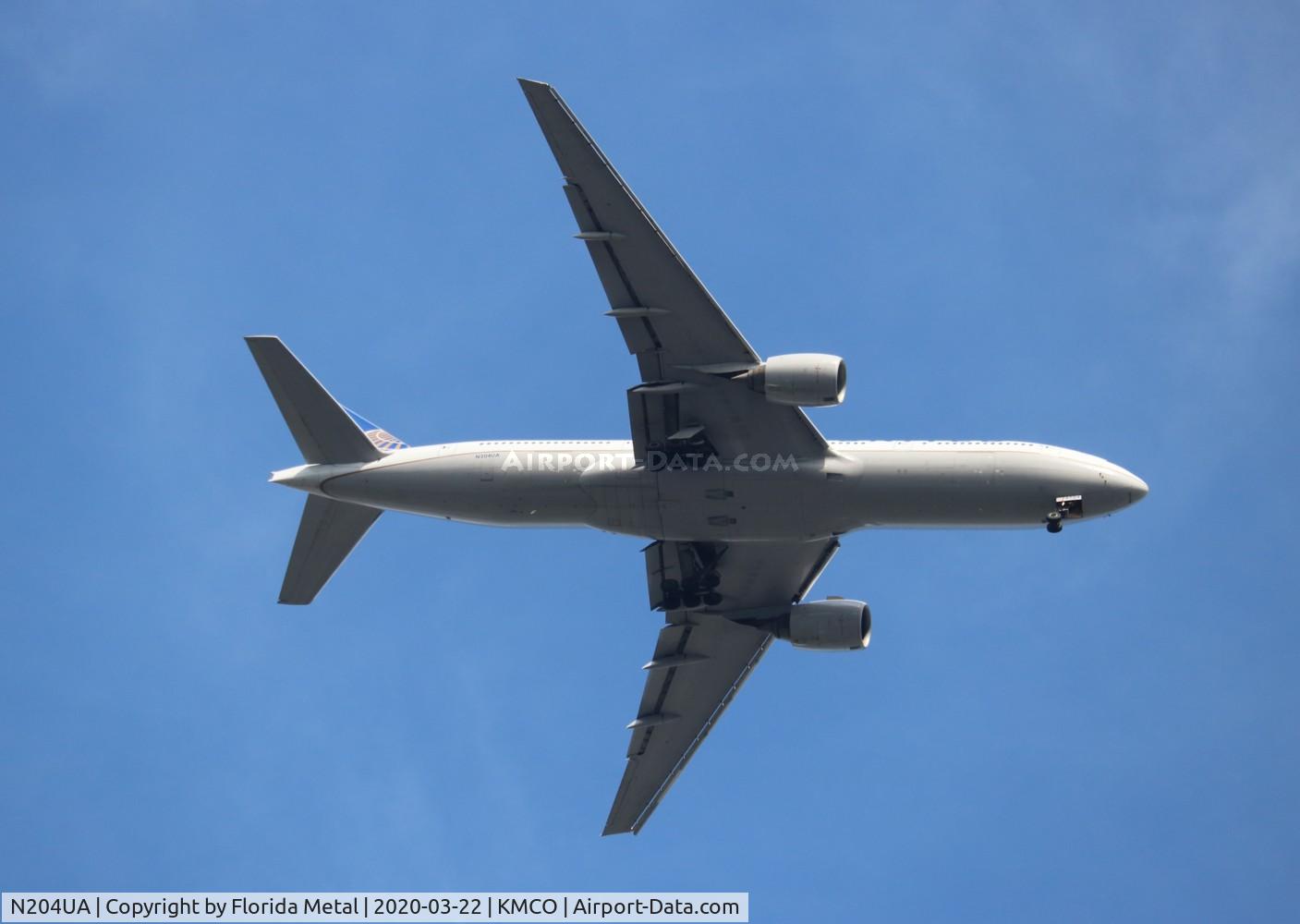 N204UA, 1999 Boeing 777-222/ER C/N 28713, MCO 2020