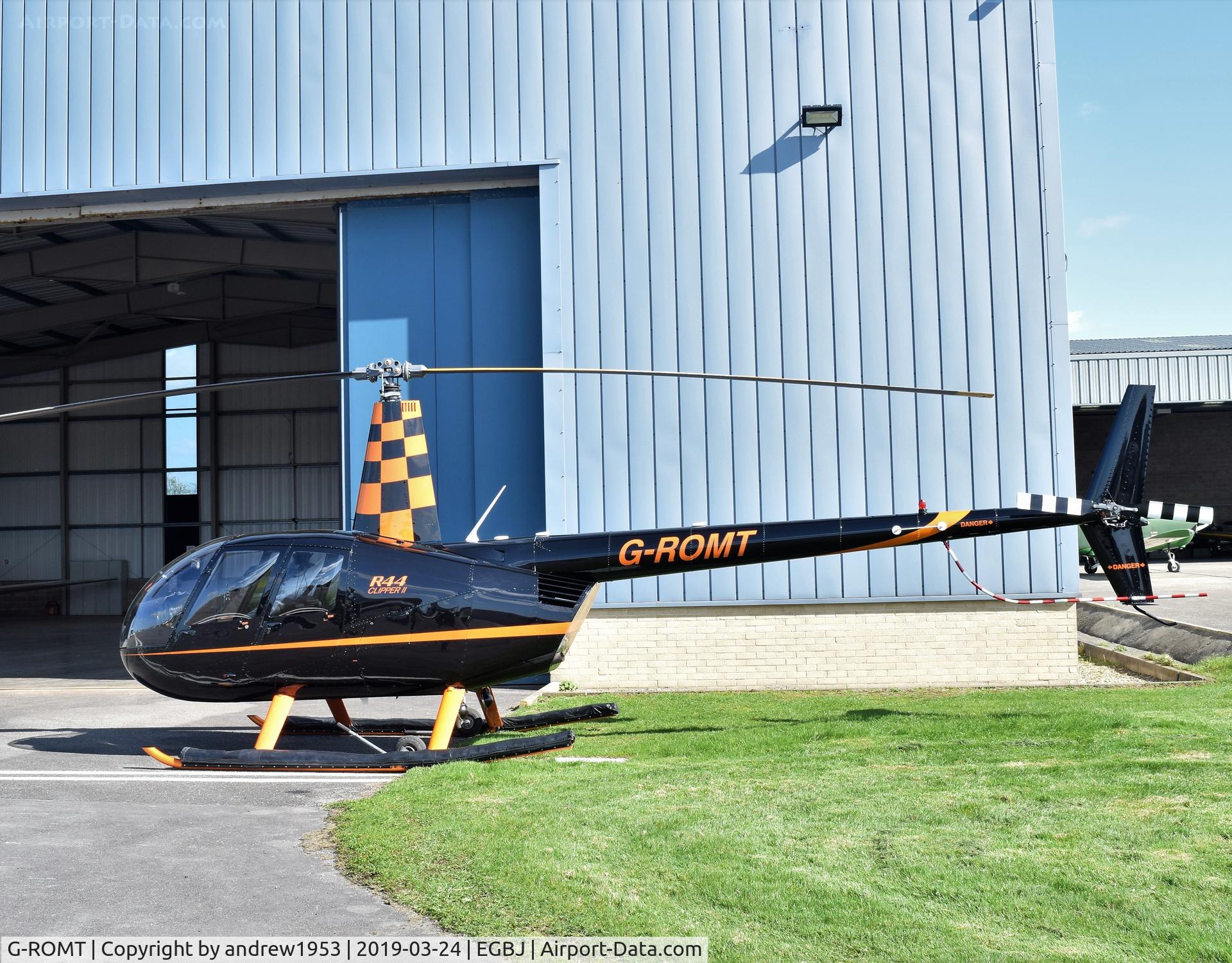 G-ROMT, 2005 Robinson R44 II C/N 10788, G-ROMT at Gloucestershire Airport.