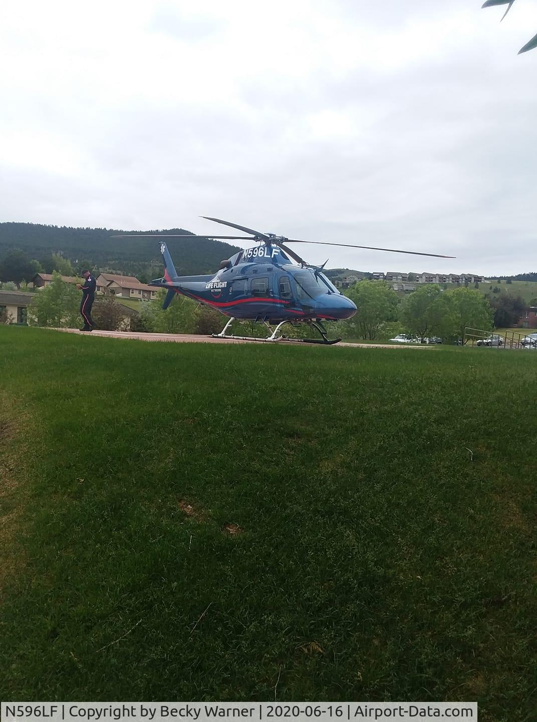 N596LF, 2013 AgustaWestland AW119 MkII C/N 14810, Awaiting the patient at St. Peter's Health in Helena, Montana