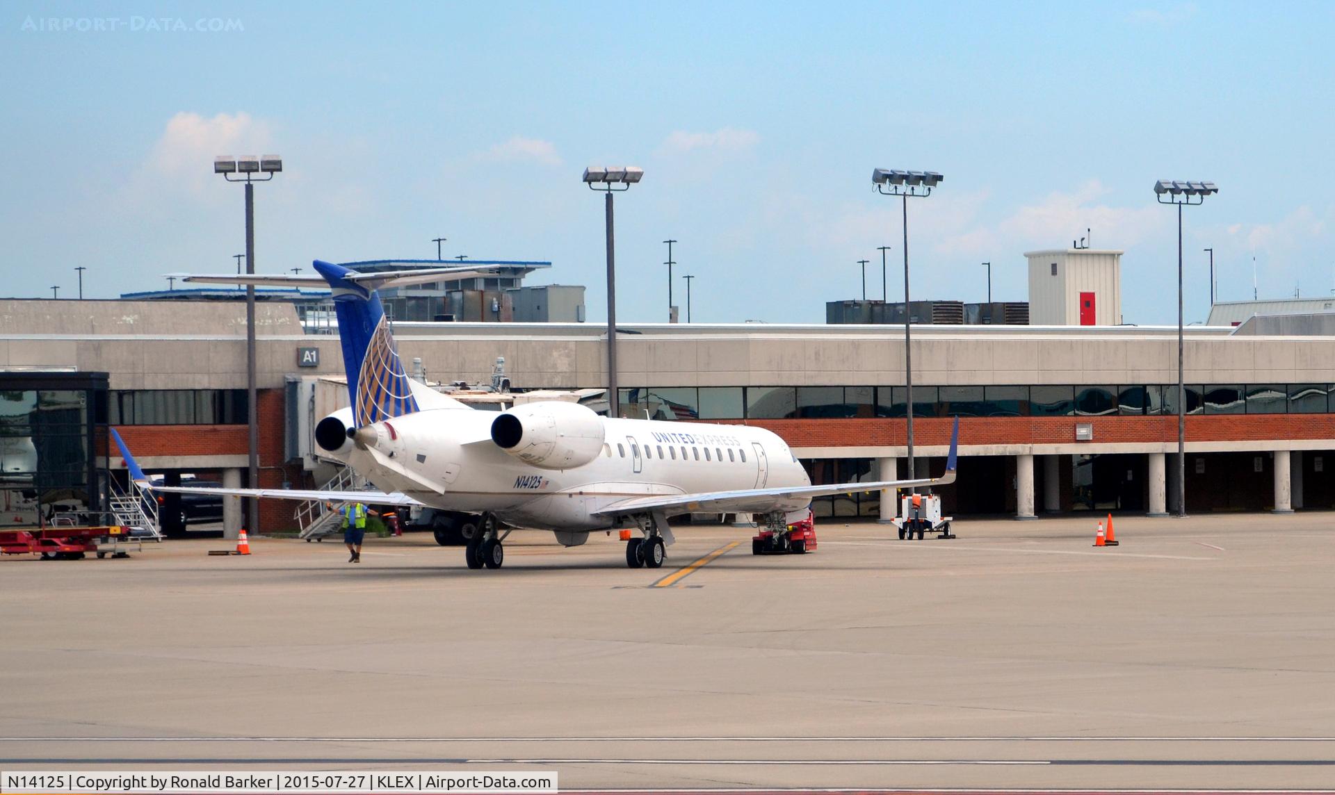 N14125, 2003 Embraer ERJ-145XR (EMB-145XR) C/N 145690, Push back Lexington