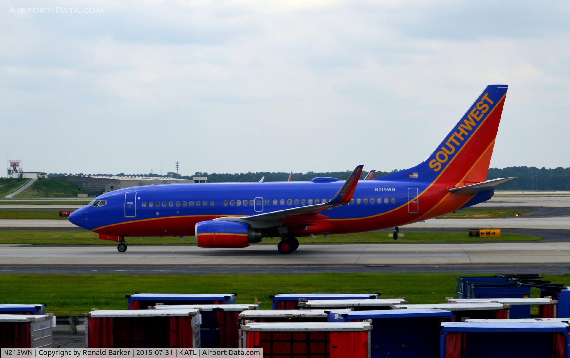 N215WN, 2005 Boeing 737-7H4 C/N 32487, Taxi Atlanta.  Named in honor of Ron Chapman, a Dallas DJ who I listened to on KLIF (1190 AM) and KVIL (103.7 FM)