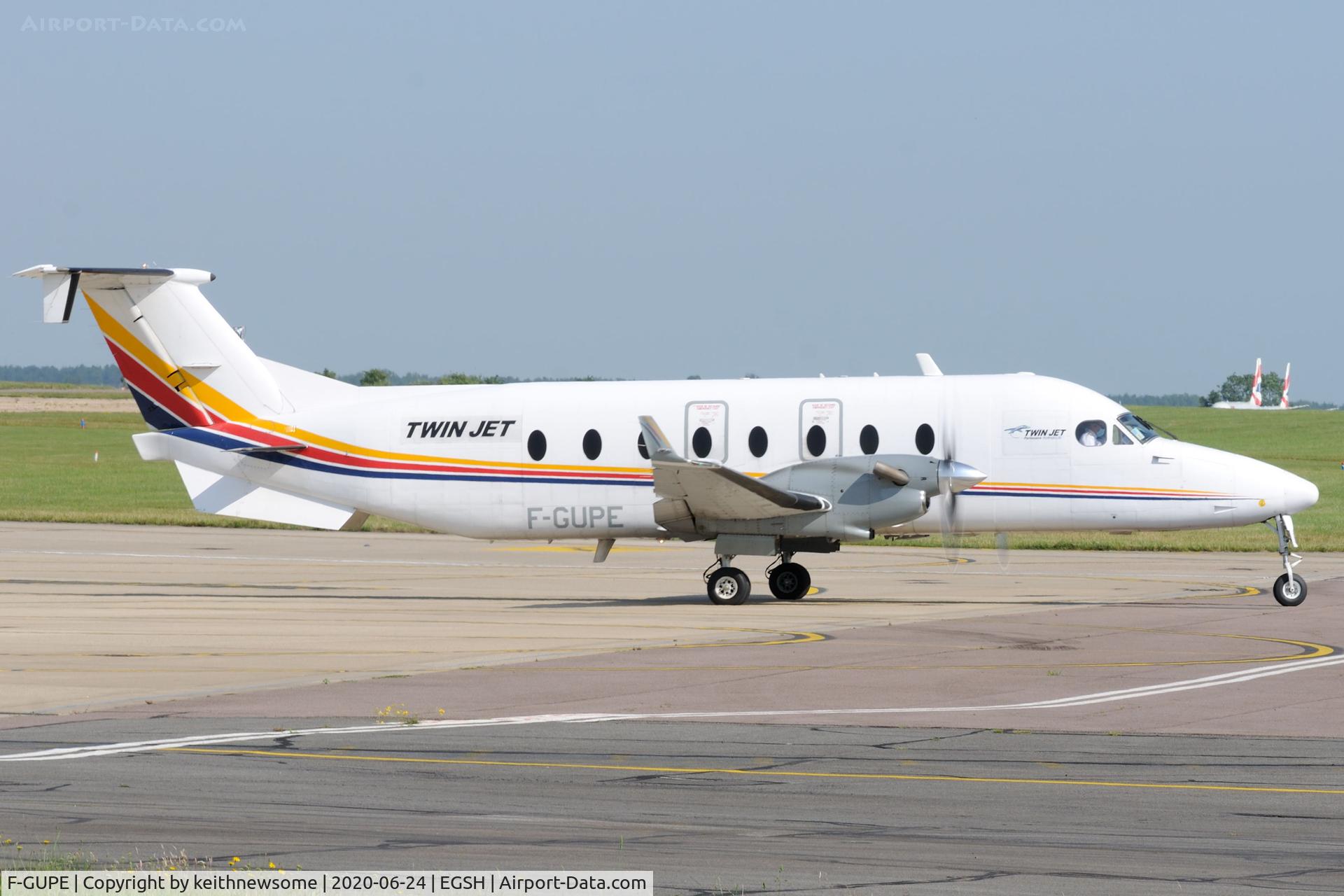 F-GUPE, 1996 Beech 1900D C/N UE-248, Leaving Norwich for Esbjerg.