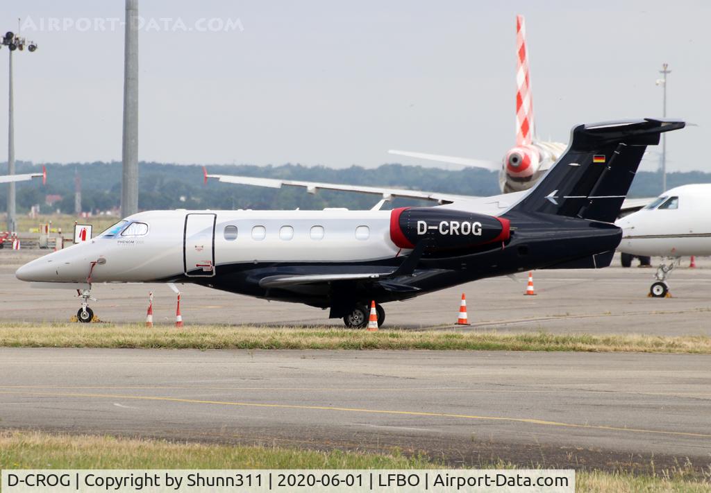 D-CROG, 2019 Embraer EMB-505 Phenom 300 C/N 50500511, Parked at the General Aviation area...