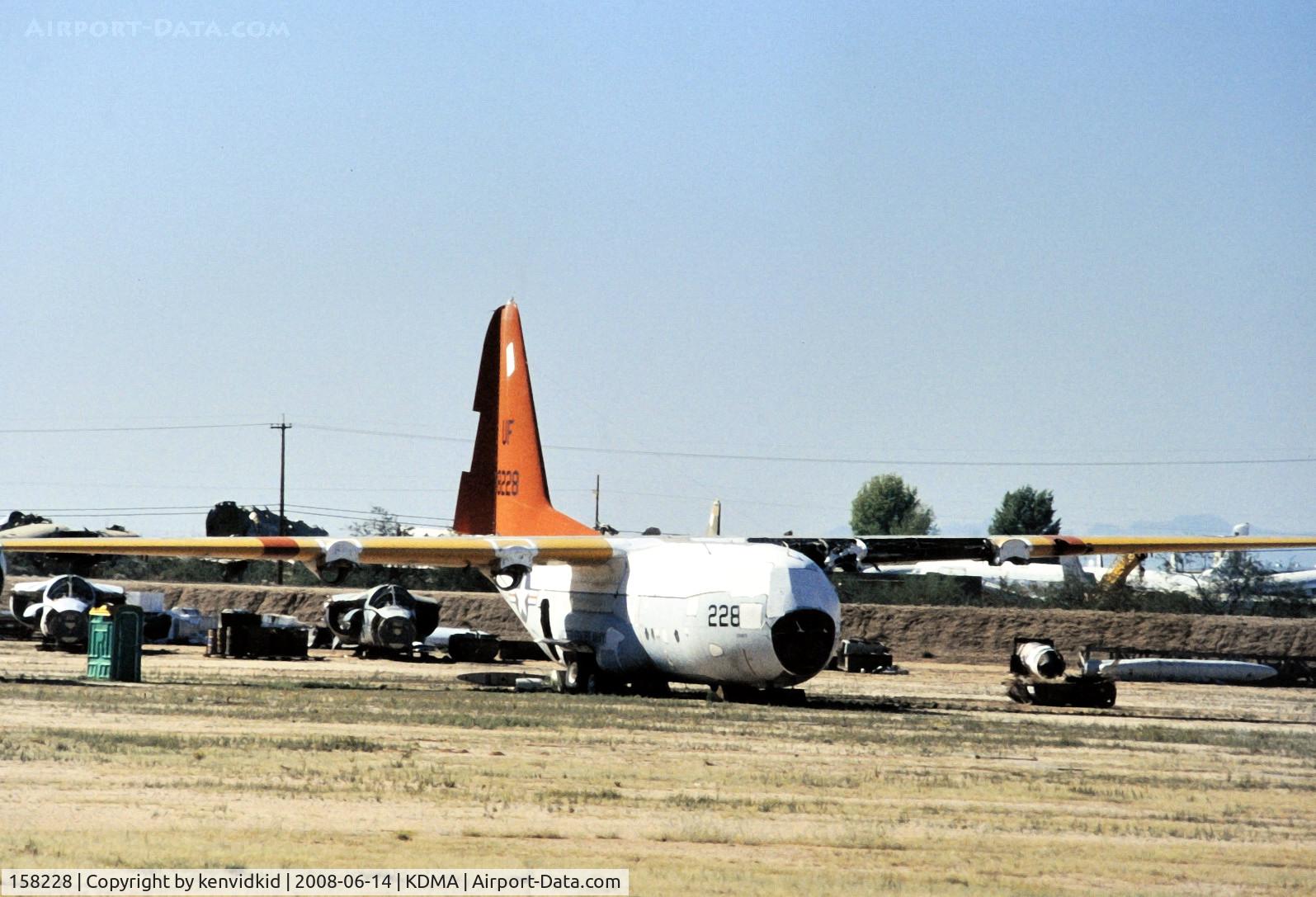 158228, 1955 Lockheed DC-130A C/N 182-3048, At Davis Monthan from an air-conditioned bus, circa 1996.
