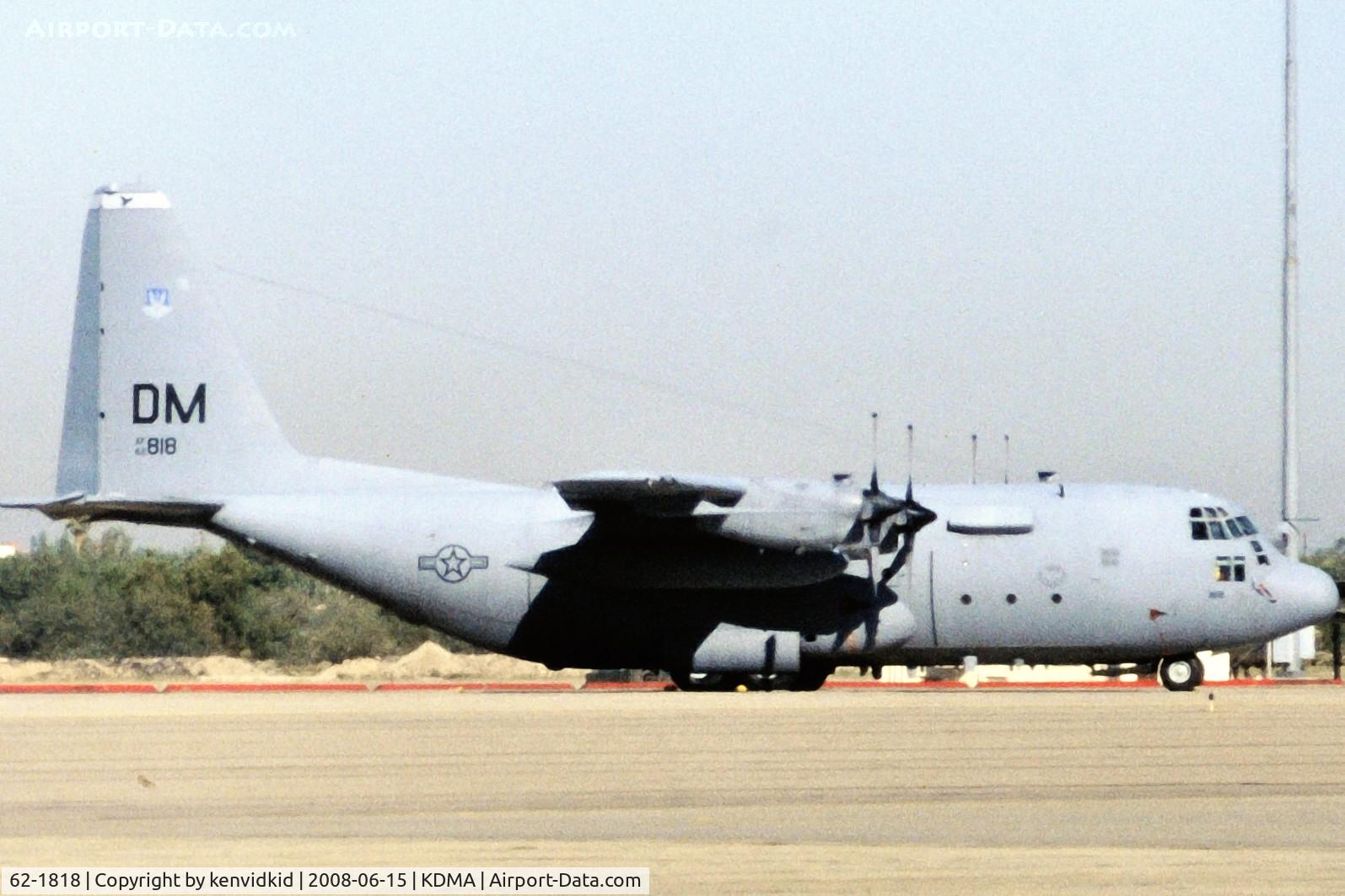 62-1818, 1962 Lockheed EC-130E Hercules C/N 382-3780, At Davis Monthan from an air-conditioned bus, circa 1996.