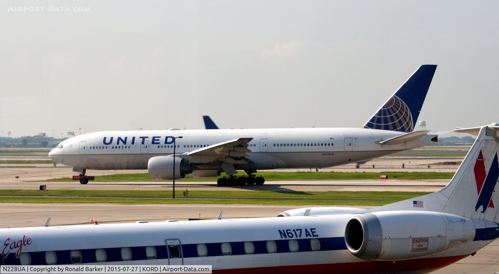 N228UA, 2002 Boeing 777-222 C/N 30556, Taxi O'Hare