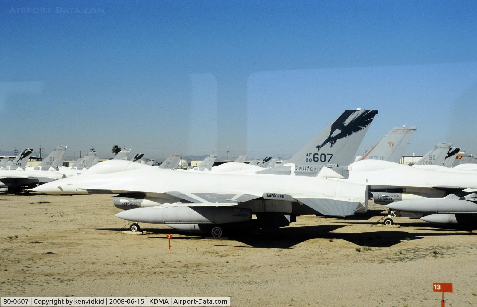 80-0607, 1980 General Dynamics F-16A/ADF Fighting Falcon C/N 61-328, At Davis Monthan from an air-conditioned bus, circa 1996.