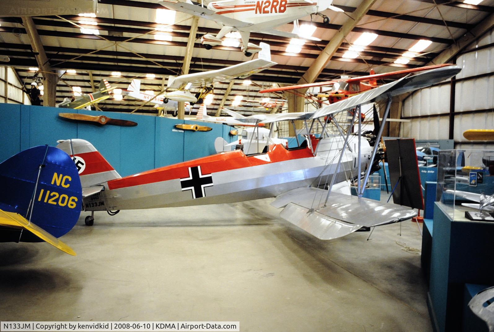 N133JM, Focke-Wulf Fw-44J Stieglitz C/N 2827, At Davis Monthan from an air-conditioned bus, circa 1996.