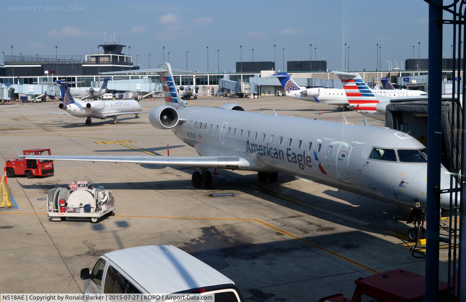 N518AE, 2003 Bombardier CRJ-701ER (CL-600-2C10) Regional Jet C/N 10126, At the gate O'Hare