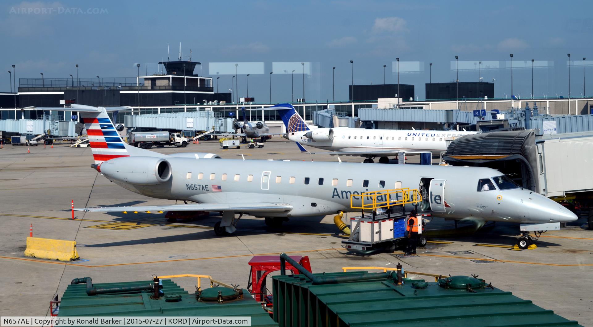 N657AE, 2003 Embraer ERJ-145LR (EMB-145LR) C/N 145744, At the gate O'Hare