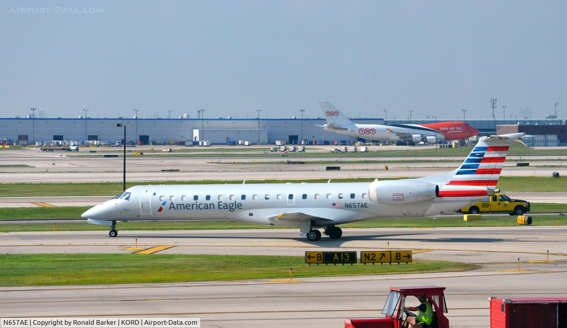 N657AE, 2003 Embraer ERJ-145LR (EMB-145LR) C/N 145744, Taxi O'Hare