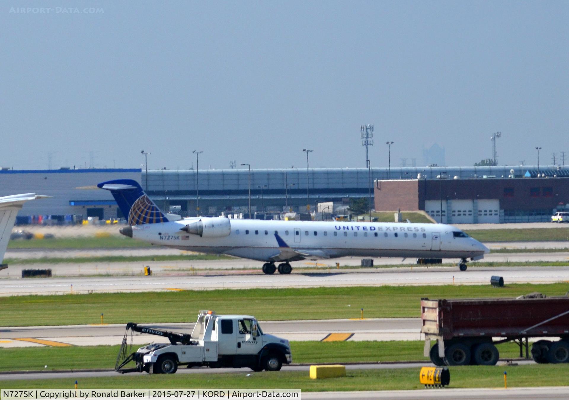 N727SK, 2005 Bombardier CRJ-701ER (CL-600-2C10) Regional Jet C/N 10191, Takeoff O'Hare