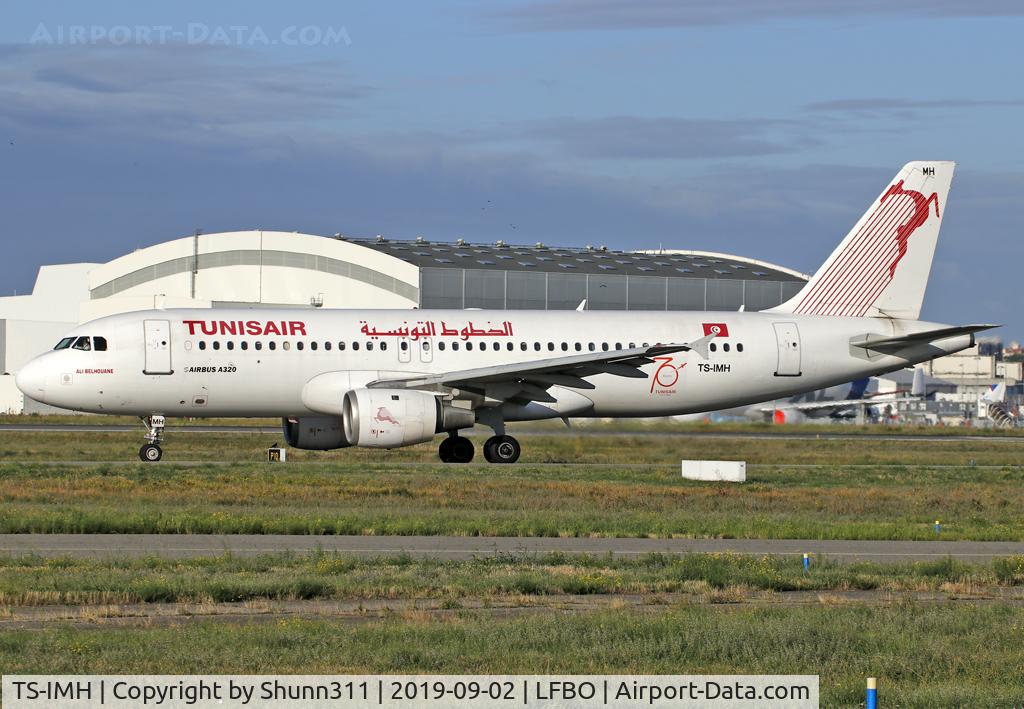 TS-IMH, 1993 Airbus A320-211 C/N 0402, Taxiing holding point rwy 32L for departure with additional 70th anniversary patch...