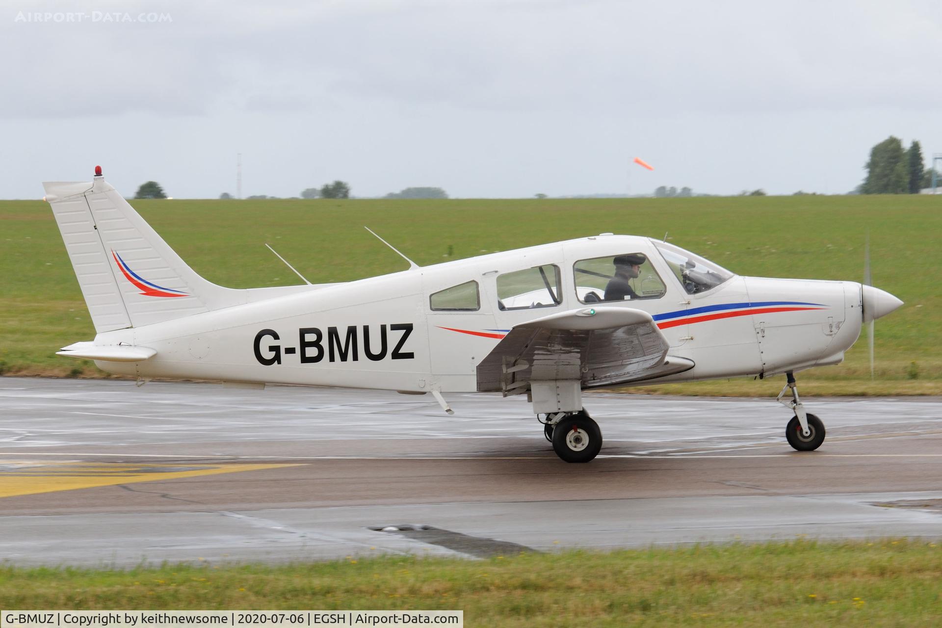 G-BMUZ, 1981 Piper PA-28-161 Cherokee Warrior II C/N 28-8016329, Leaving wet Norwich.