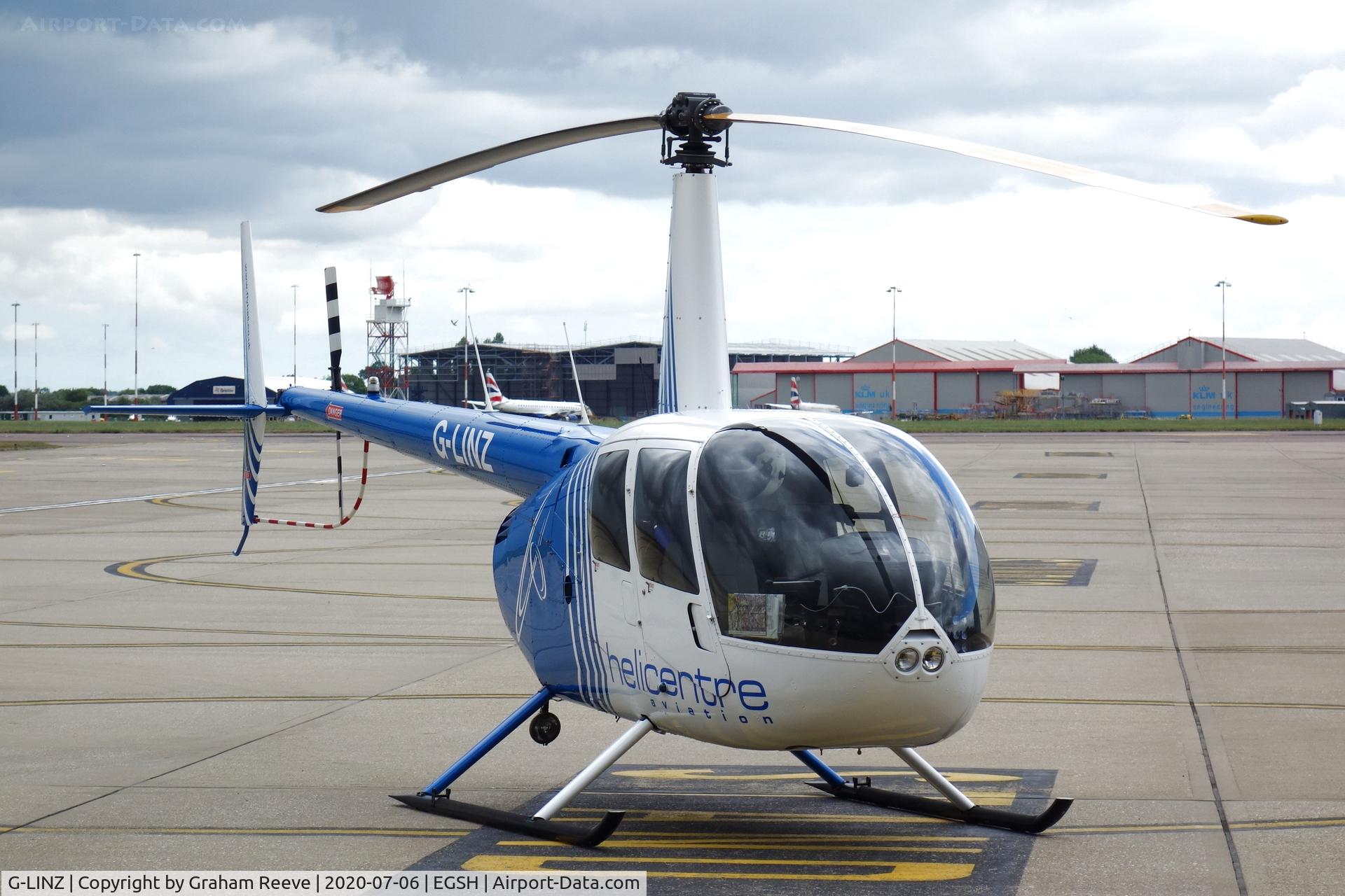 G-LINZ, 2007 Robinson R44 Raven II C/N 11911, Parked at Norwich.