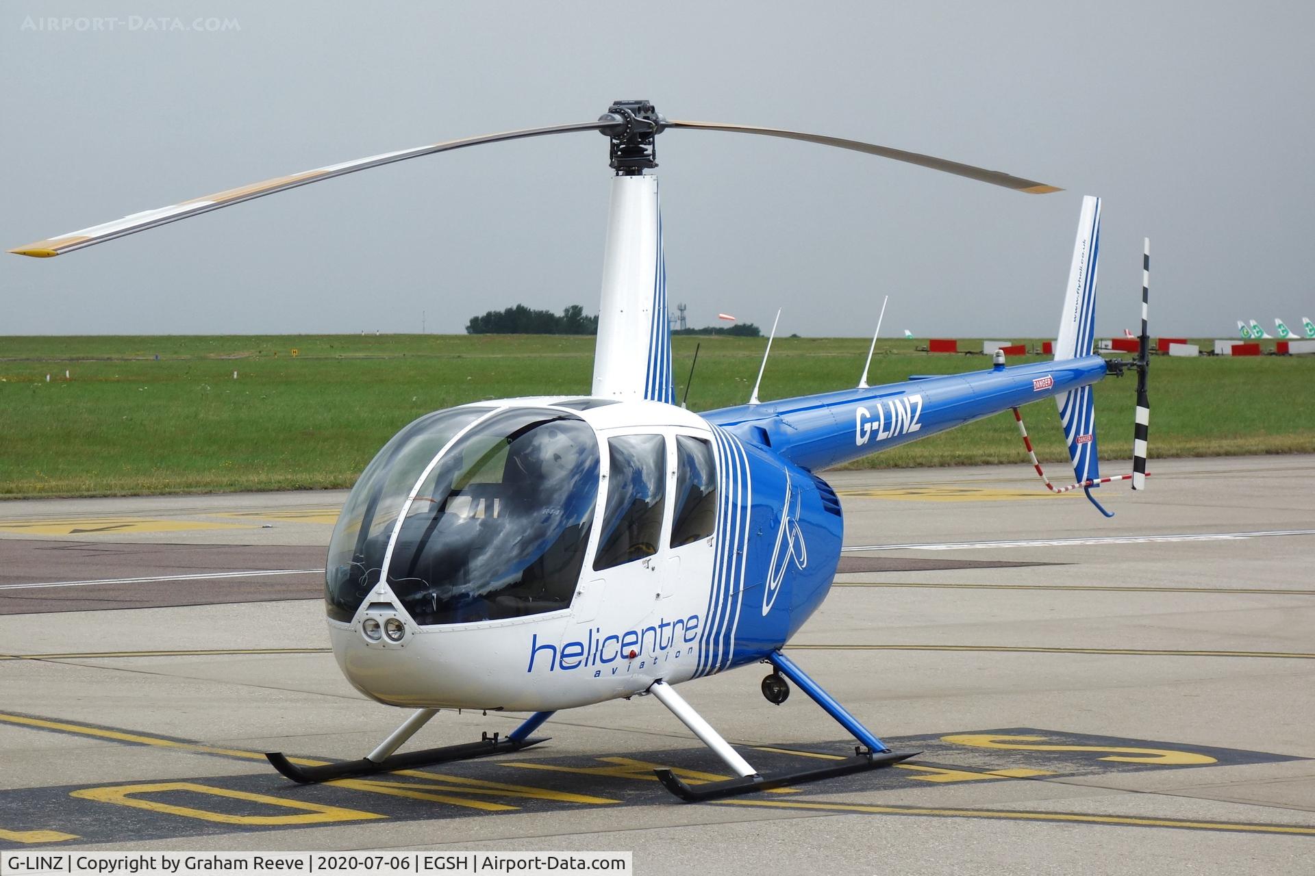 G-LINZ, 2007 Robinson R44 Raven II C/N 11911, Parked at Norwich.