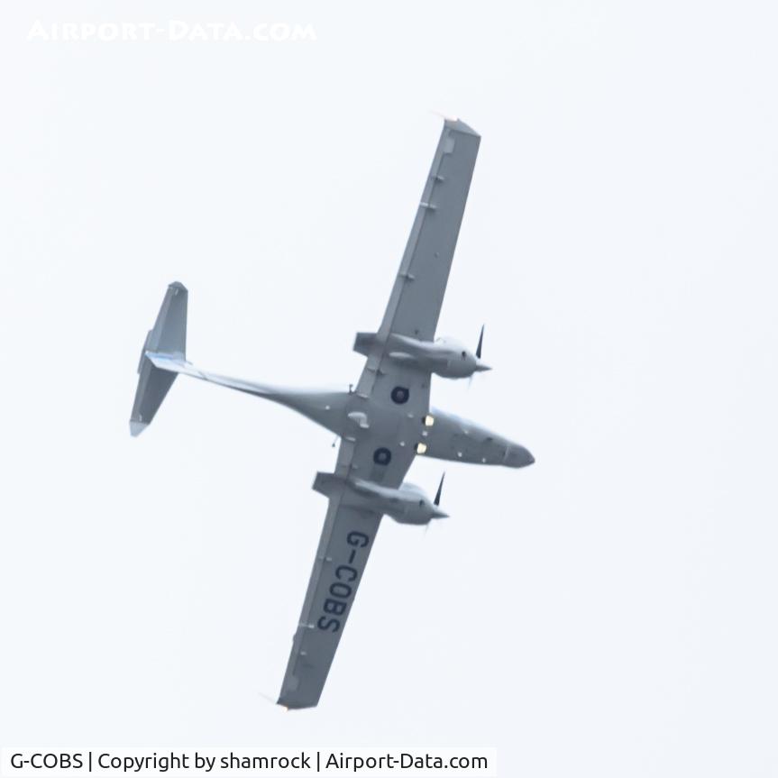 G-COBS, 2011 Diamond DA-42M-NG Twin Star C/N 42.MN020, Over Holkham Hall, Nofolk, England.