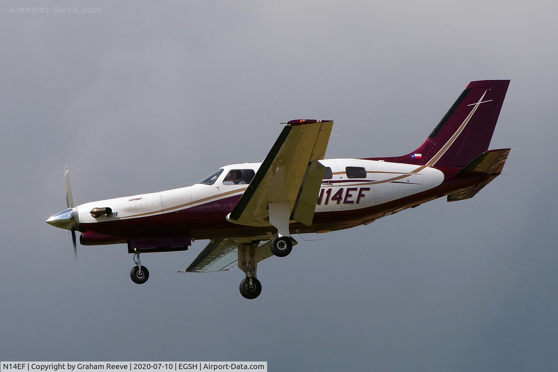 N14EF, 1988 Piper PA-46-350P Malibu Mirage C/N 4622009, Landing at Norwich.