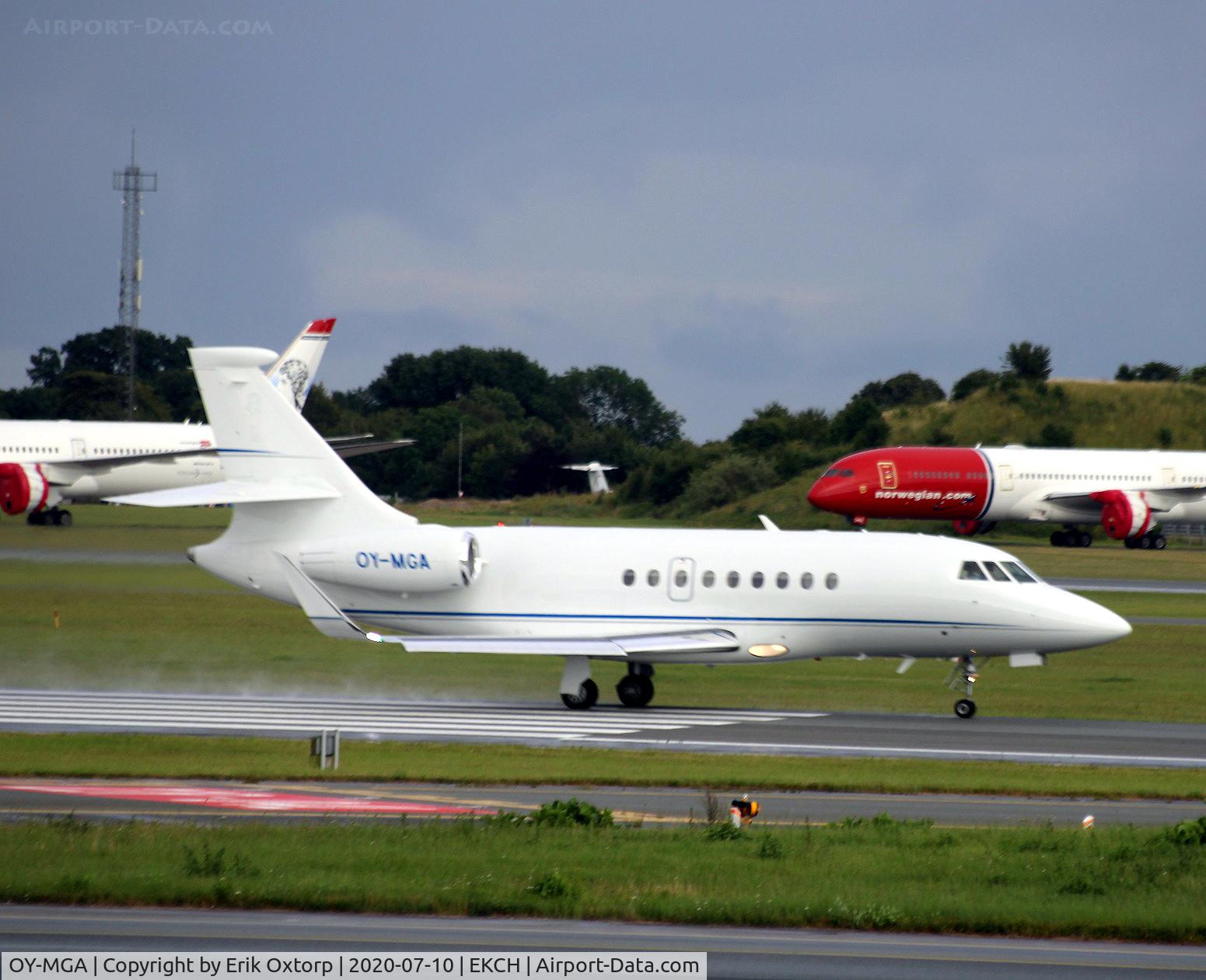OY-MGA, 2015 Dassault Falcon 2000LX C/N 311, OY-MGA taking off rw 22R