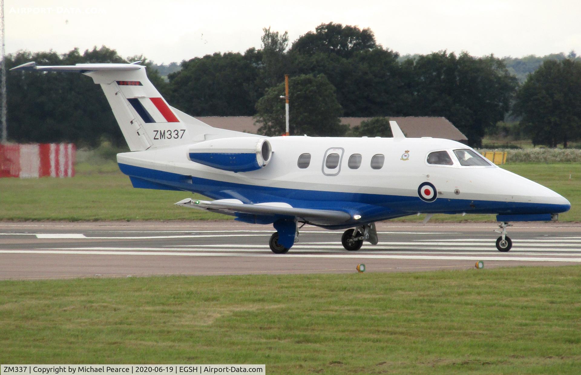 ZM337, 2017 Embraer EMB-500 Phenom 100 C/N 50000386, Turning onto RWY 27 on return to RAF Cranwell (CWL).