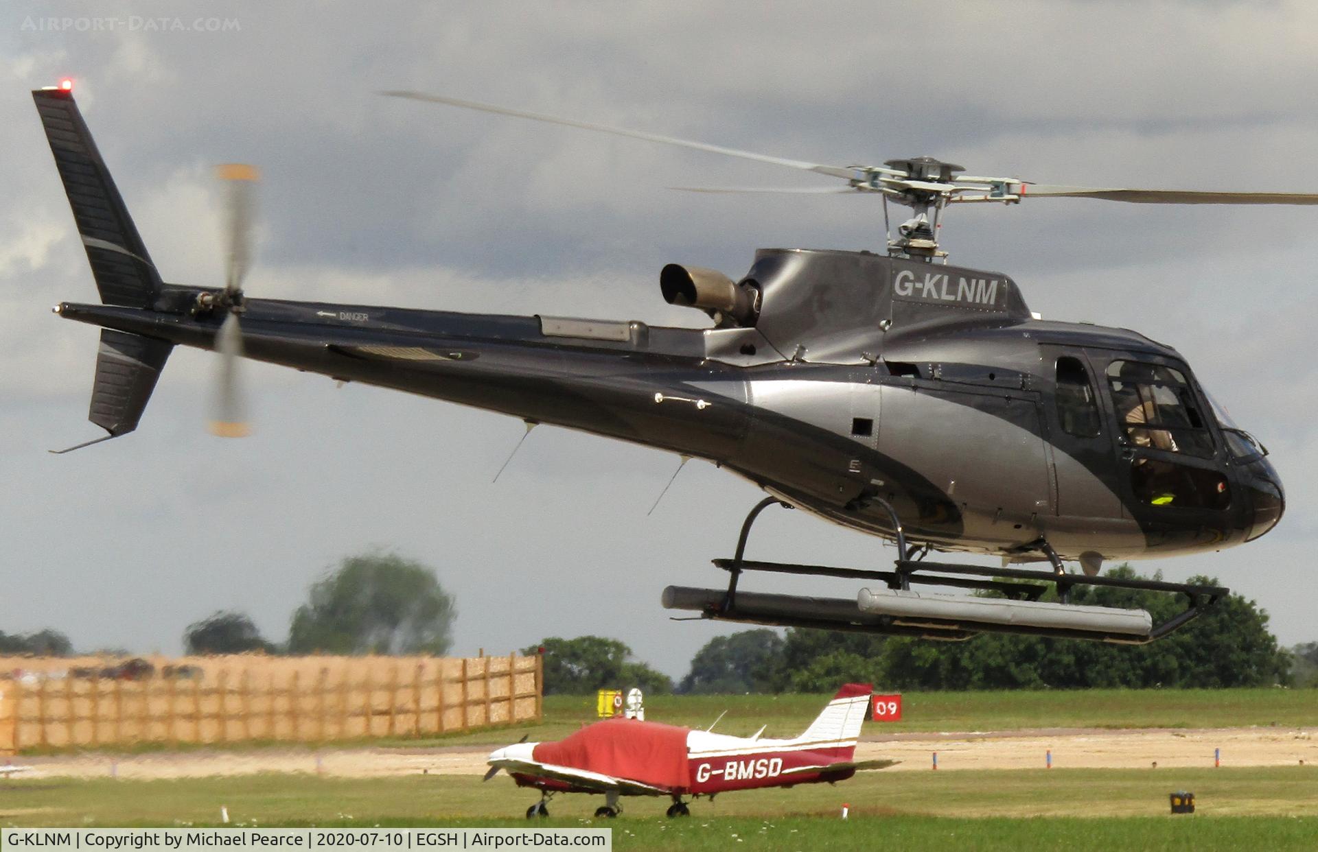 G-KLNM, 2014 Eurocopter AS-350B-3 Ecureuil Ecureuil C/N 7827, Departing the company ramp to pick up a passenger from Somerleyton in Suffolk.