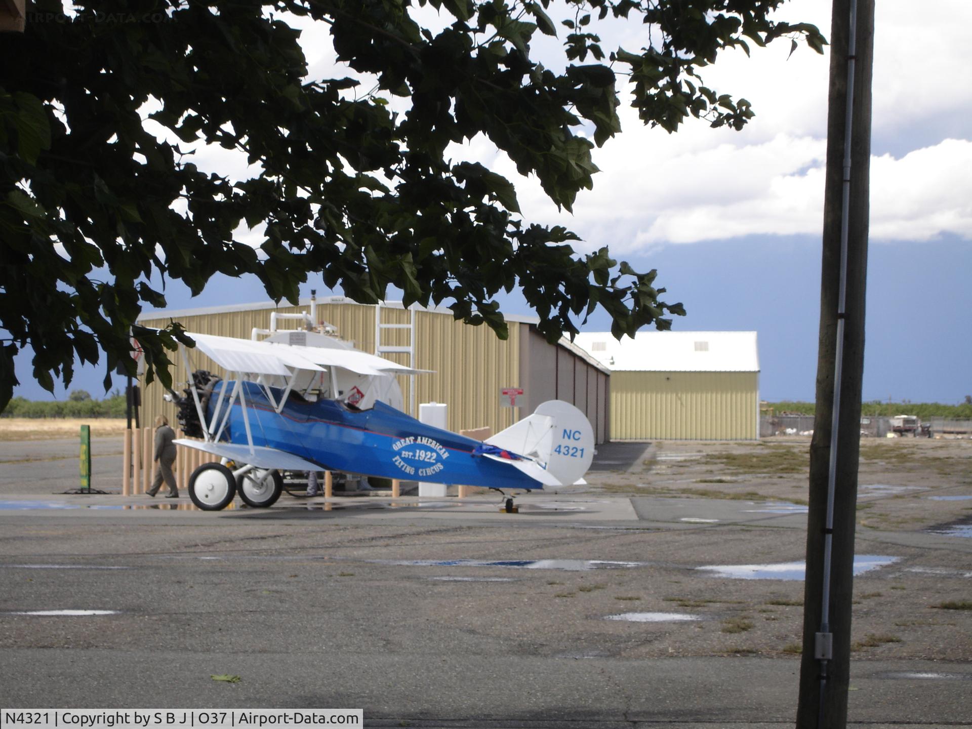 N4321, 1930 Curtiss-Wright Travel Air 4000 C/N 374, 321 made this stop for gas and waited several hours for conditions to improve as they flew north. You can see how dark it is in the picture.