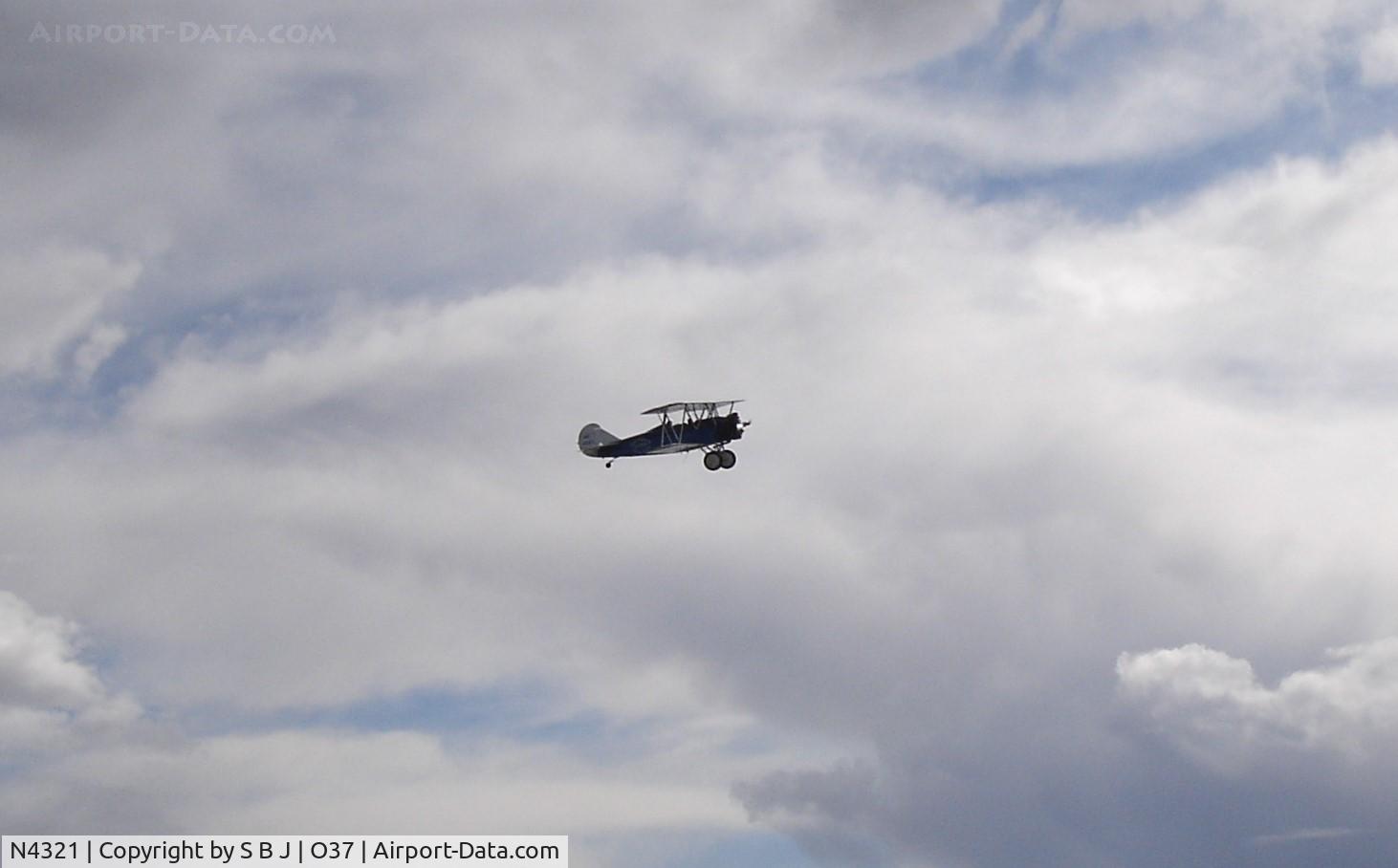 N4321, 1930 Curtiss-Wright Travel Air 4000 C/N 374, Departing Orland, Ca after a several hour stop.