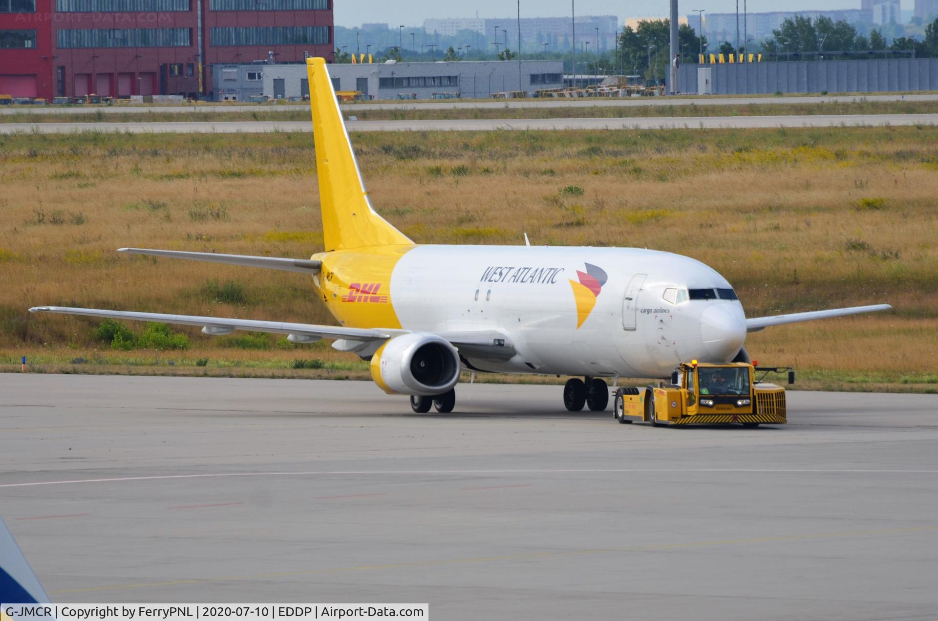 G-JMCR, 1992 Boeing 737-4Q8(SF) C/N 25372, West Atlantic B734F under tow to parking area