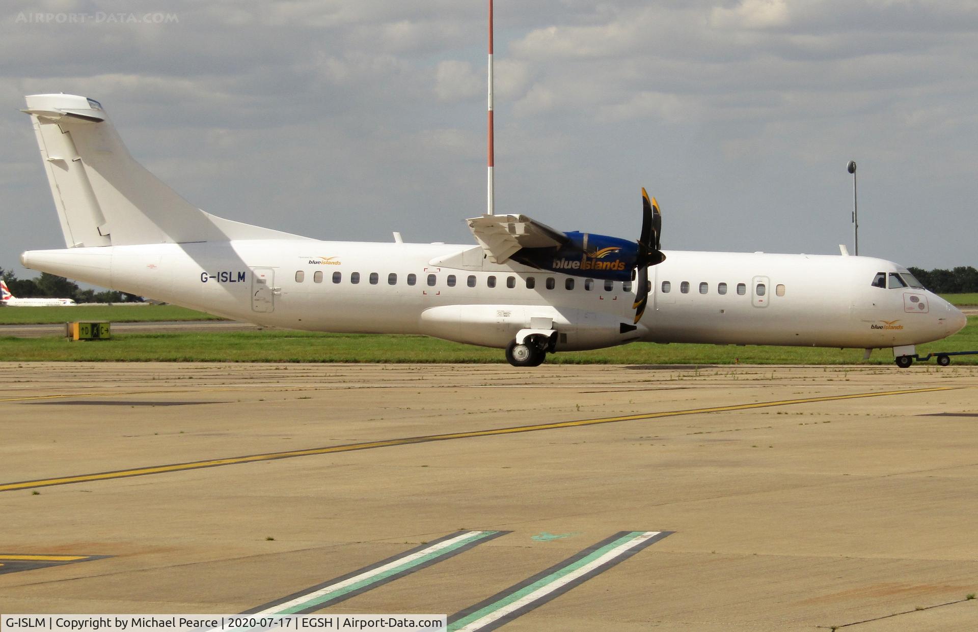 G-ISLM, 2007 ATR 72-212A C/N 762, Under tow from Stand 3 for respray.