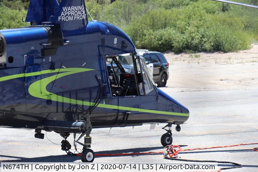 N674TH, 2004 Kaman K-1200 K-Max C/N A94-0035, Working at Big Bear Ca
