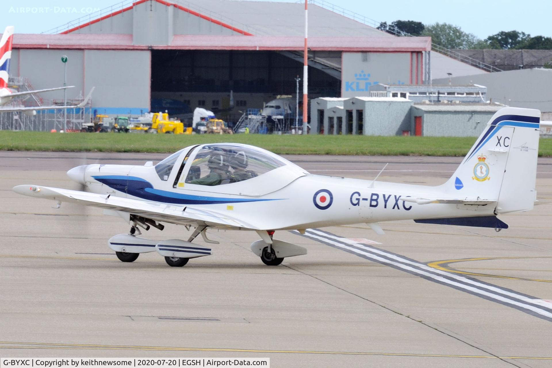 G-BYXC, 2001 Grob G-115E Tutor T1 C/N 82163/E, Leaving Norwich for Cranwell.