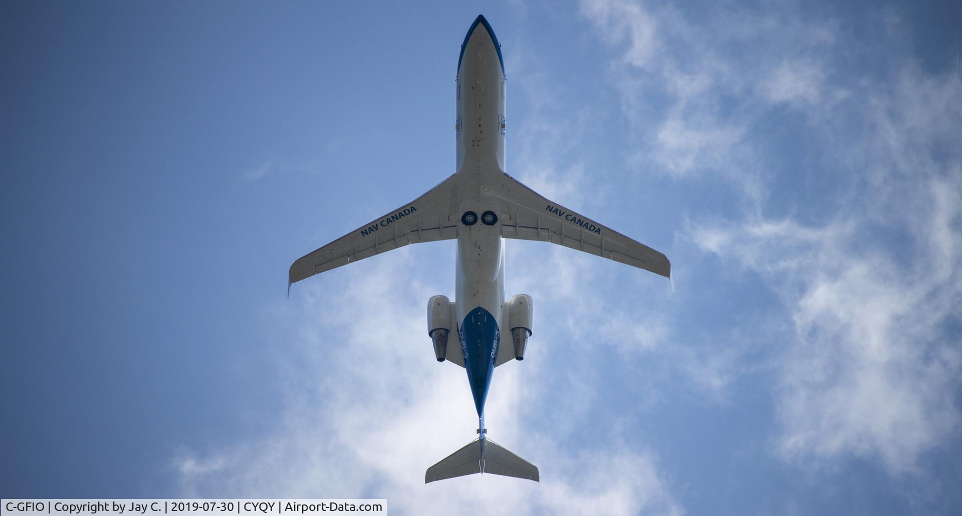 C-GFIO, 2001 Bombardier CRJ-200ER (CL-600-2B19) C/N 7526, Located 9km from airport, low pass over home on its way back to CYQY.