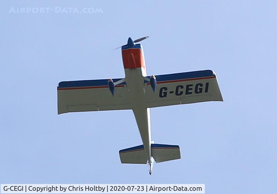 G-CEGI, 2003 Van's RV-8 C/N 81480, RV8 Vans flying fast over Potters Bar from its base in North Weald