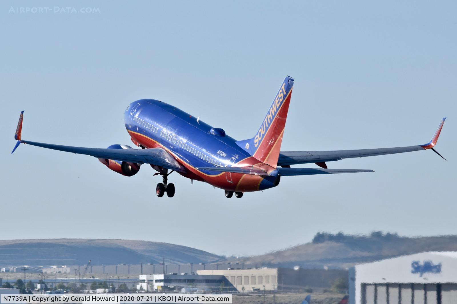 N7739A, 2006 Boeing 737-7BD C/N 35110, Climb out from 10L.
