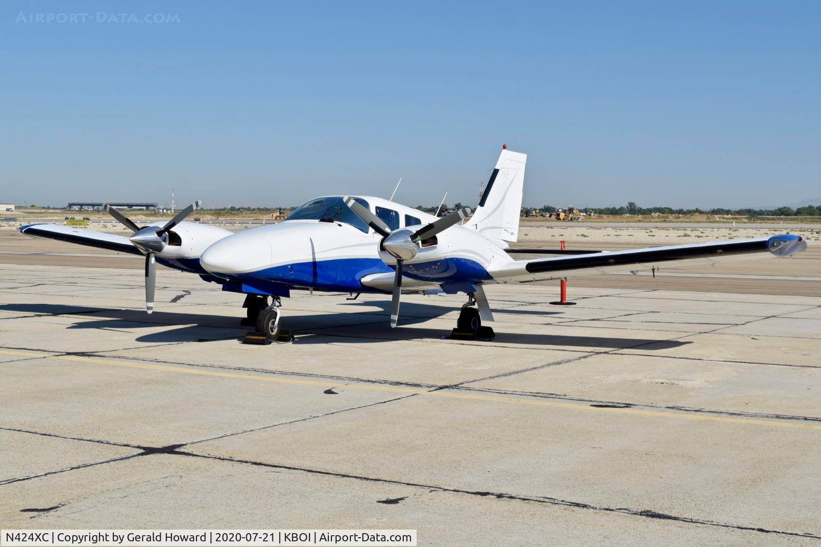 N424XC, 1990 Piper PA-34-220T Seneca C/N 344-8005, Parked on the south GA ramp.