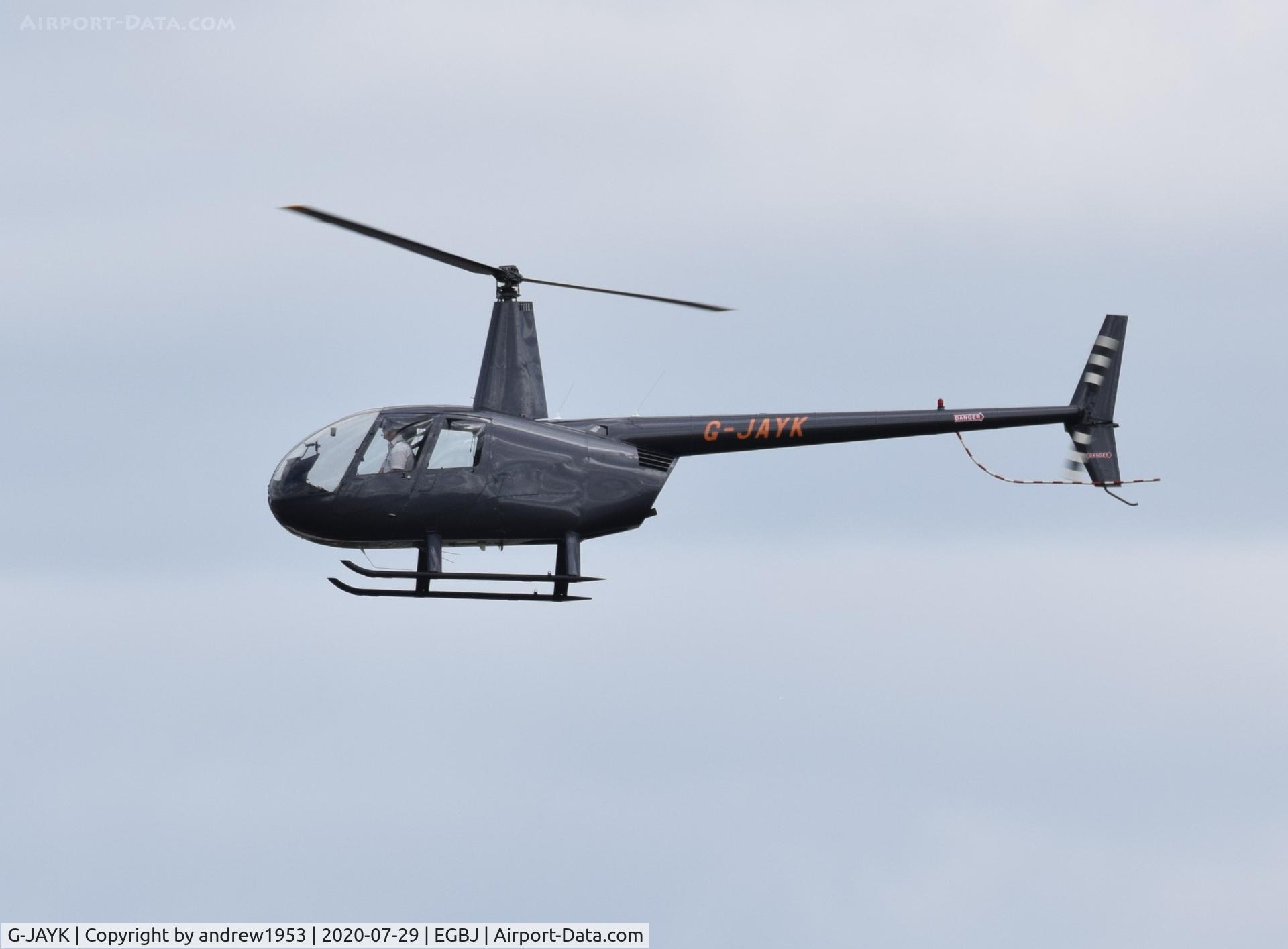 G-JAYK, 2003 Robinson R44 Raven II C/N 10147, G-JAYK landing at Gloucestershire Airport.
