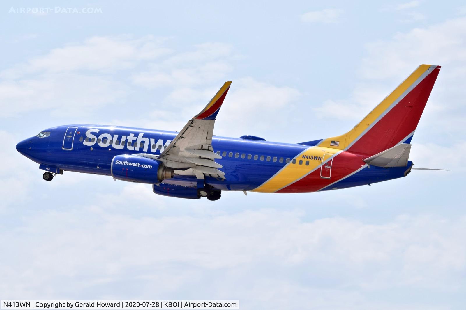 N413WN, 2001 Boeing 737-7H4 C/N 29819, Climb out from 10L.