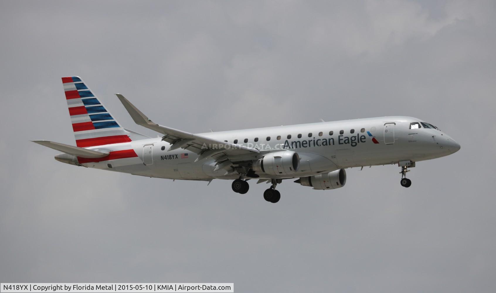 N418YX, 2013 Embraer 175LR (ERJ-170-200LR) C/N 17000383, MIA 2015