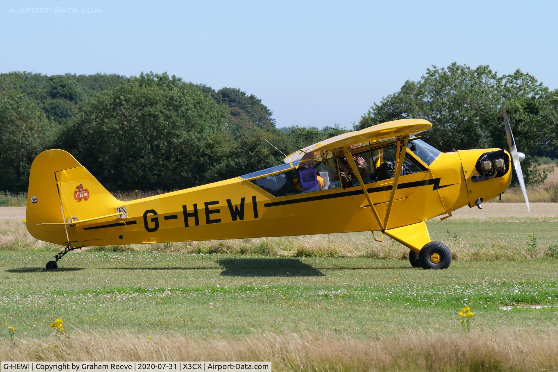 G-HEWI, 1944 Piper L-4J Grasshopper (J3C-65D) C/N 12566, Just landed at Northrepps.