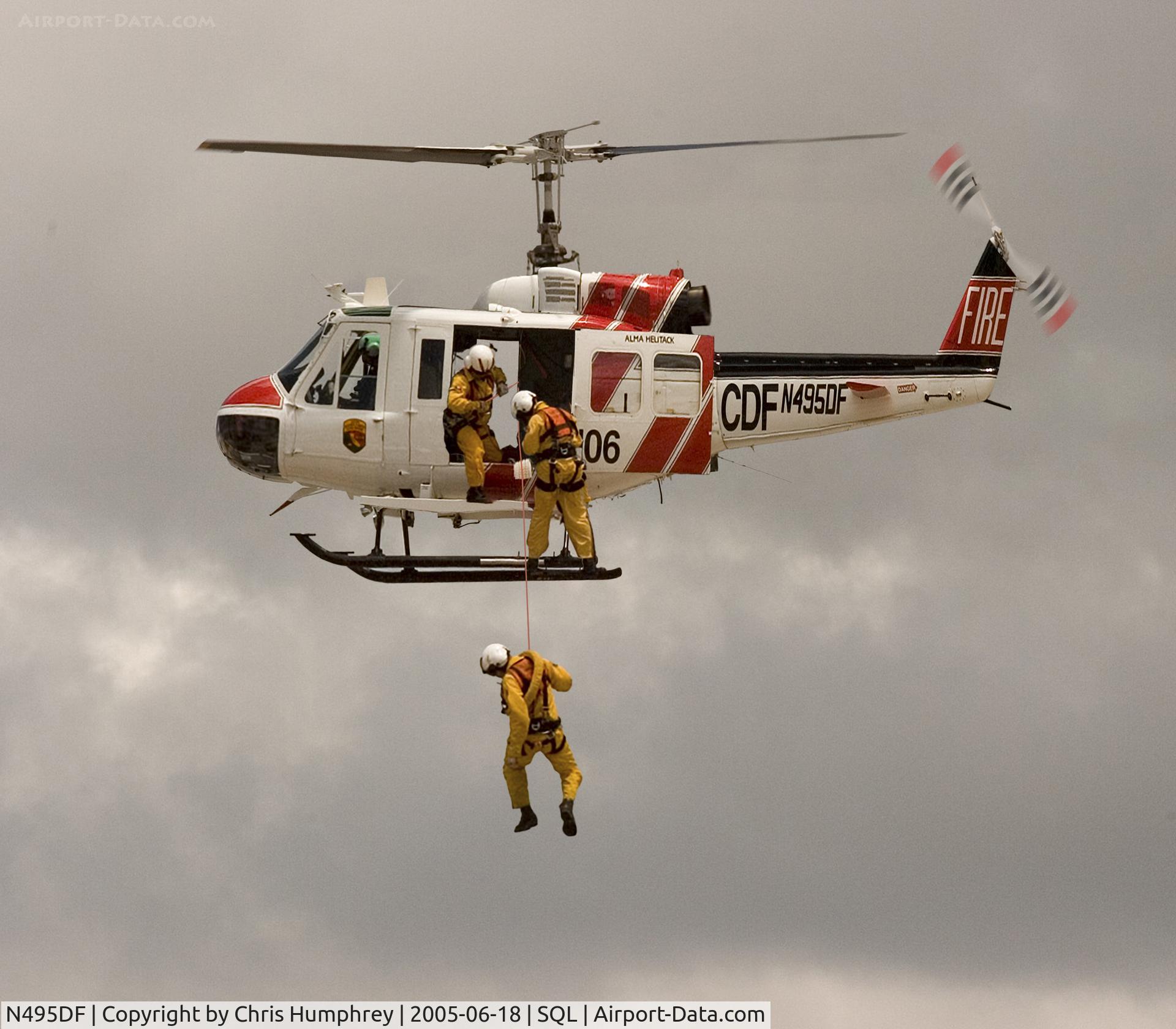 N495DF, Bell EH-1H C/N 12218, A demonstration at the Vertical Challenge air show in San Carolos CA