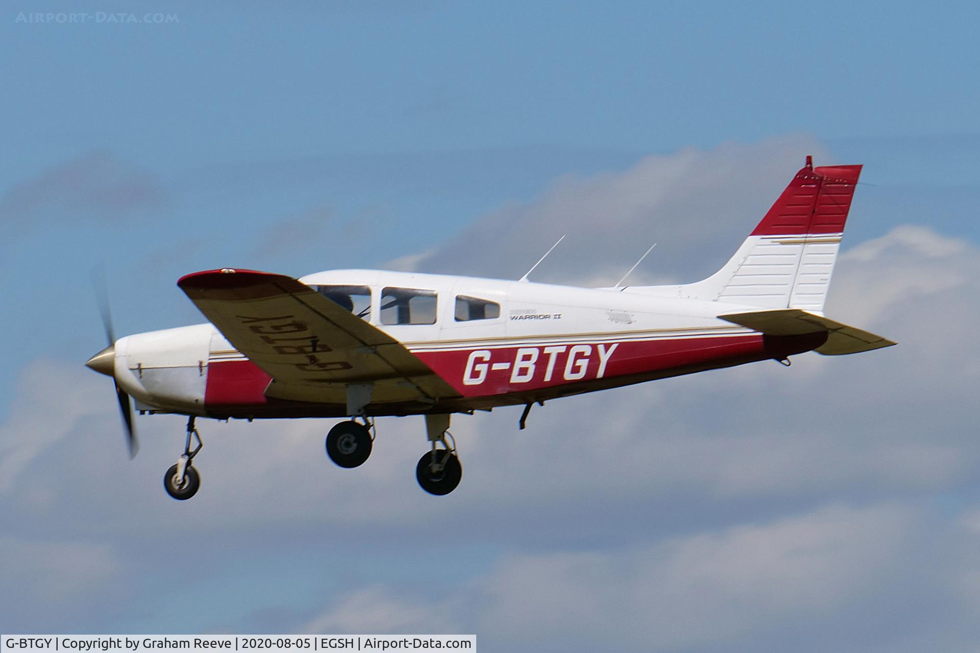 G-BTGY, 1982 Piper PA-28-161 Cherokee Warrior II C/N 28-8216199, Landing at Norwich.