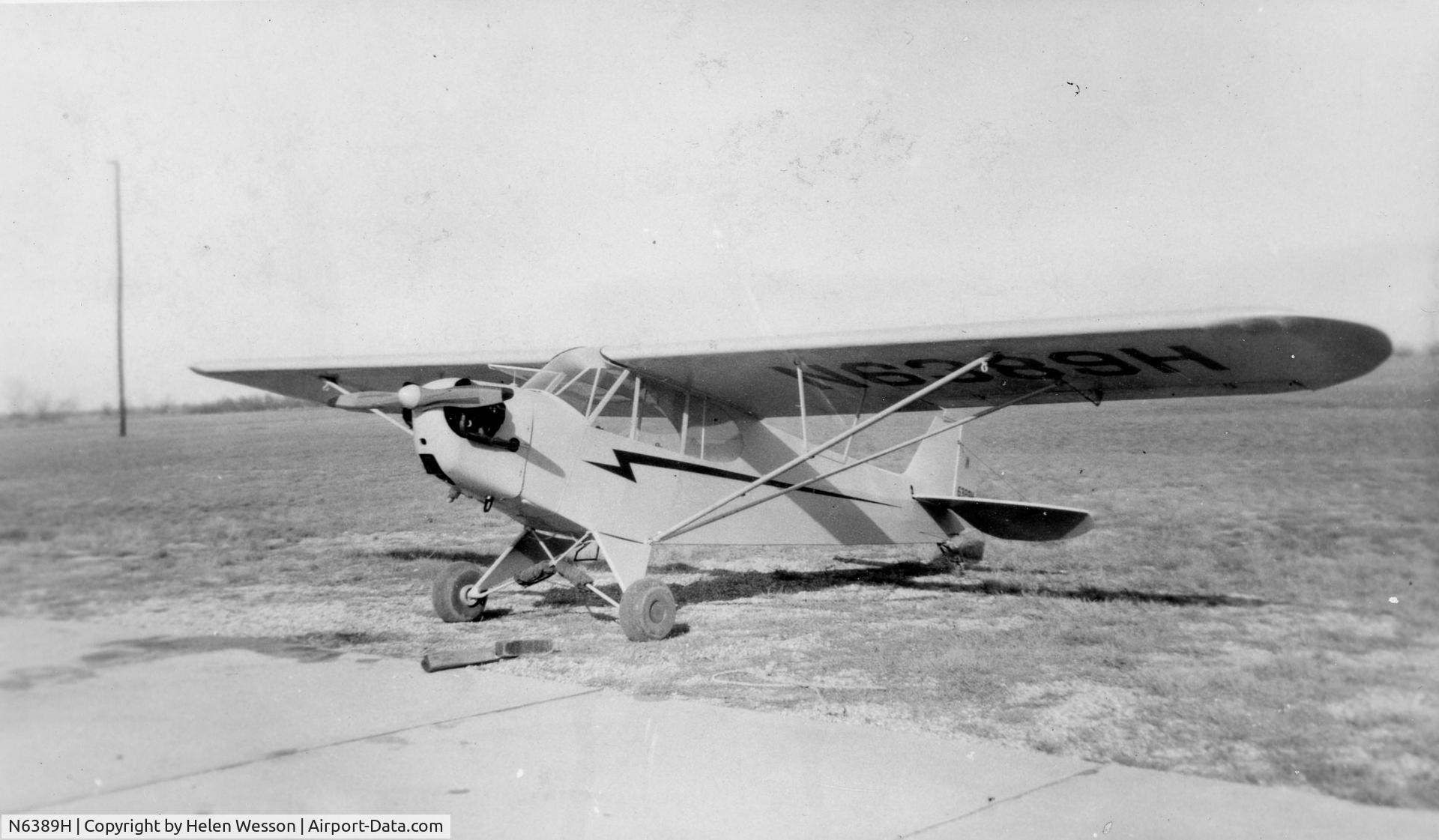 N6389H, 1946 Piper J3C-65 Cub C/N 19569, N6389H parked at the Tupelo, Mississippi, airfield in the 1950s.  It was painted grey with red trim and had gray and red plaid seat covers to be different.
