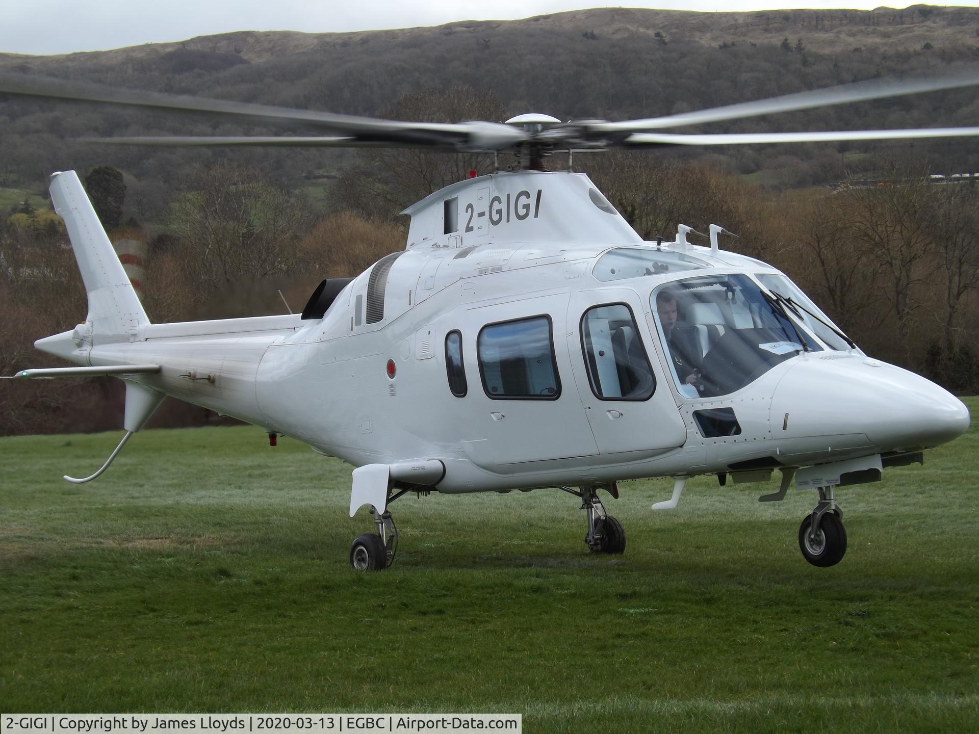 2-GIGI, 1997 AgustaWestland A-109E Power C/N 11010, Going to parking at the Cheltenham helipad for the Gold Cup.