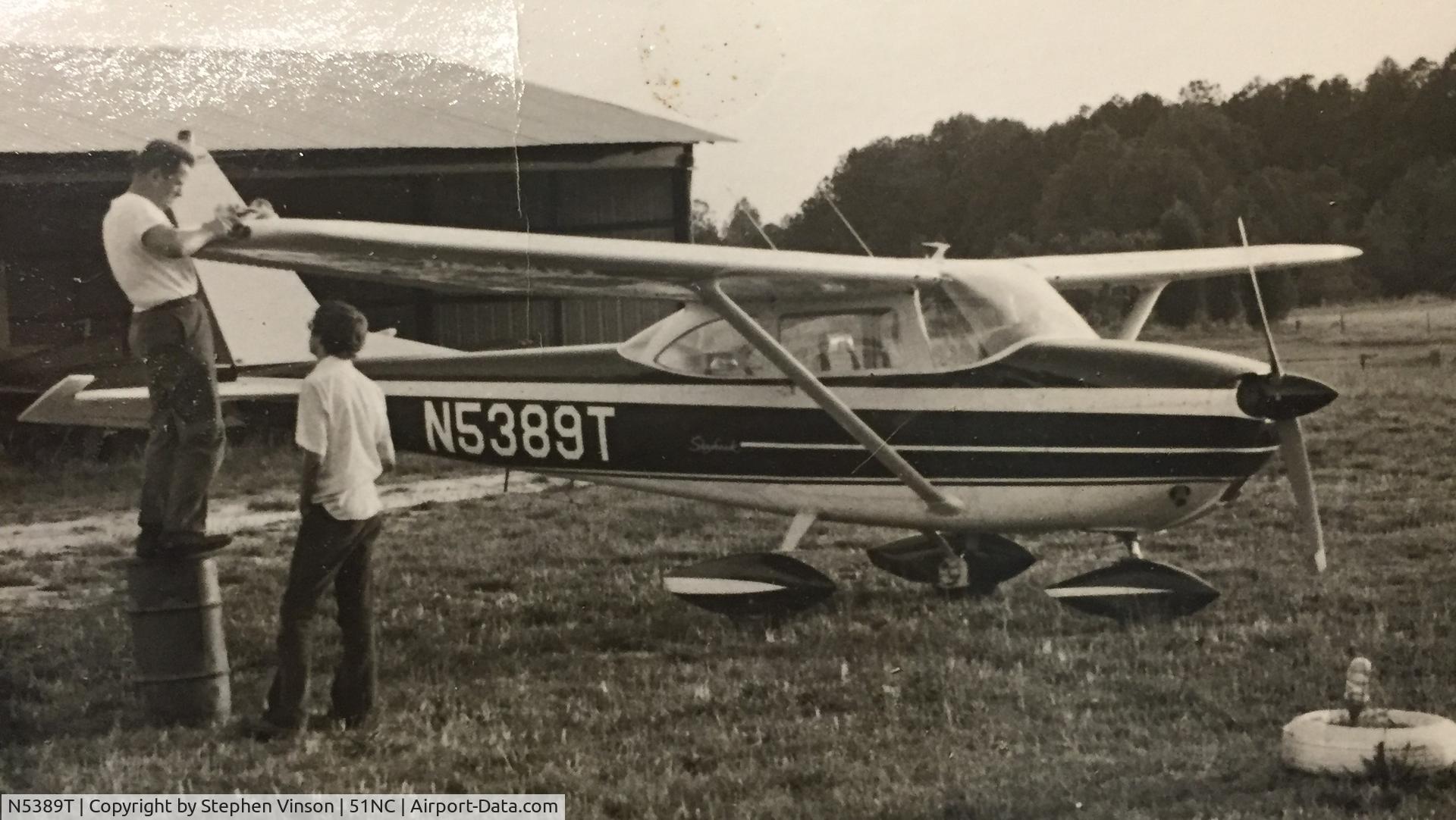 N5389T, 1964 Cessna 172E C/N 17251289, Cessna 172E N5389T owned at time by father JB Vinson based out of Zebulon NC private field.  Photo of Dad and brother David replacing nav light in 70s.