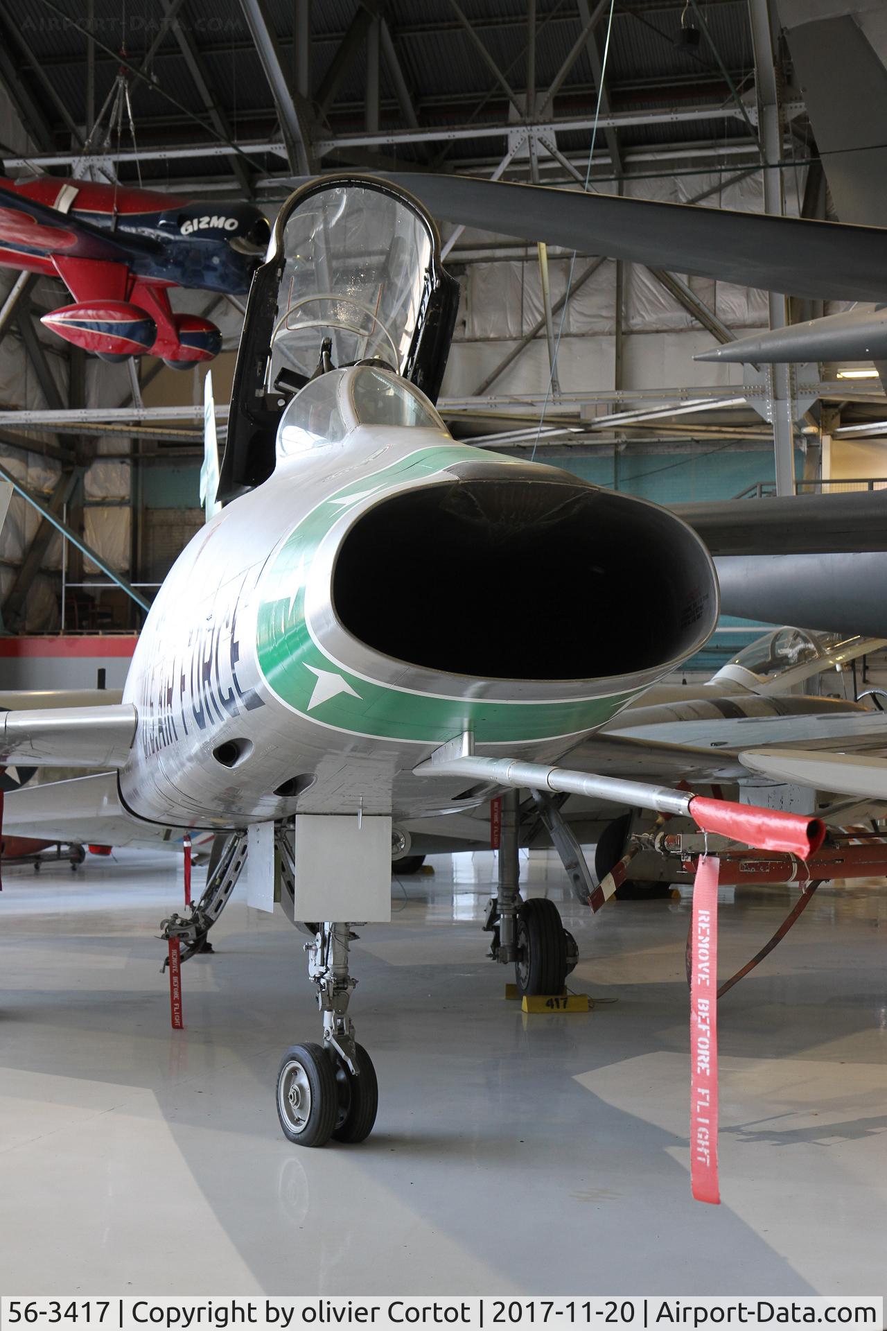56-3417, North American F-100D  Super Sabre C/N 245-67, packed with other planes, Wings Over the Rockies Air & Space Museum